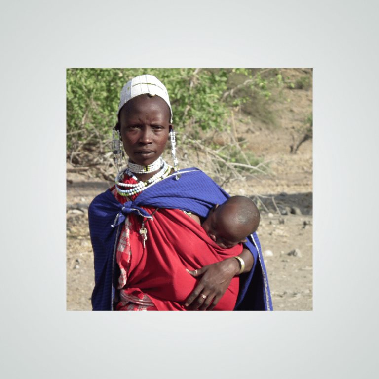 Tanzania woman holding her baby