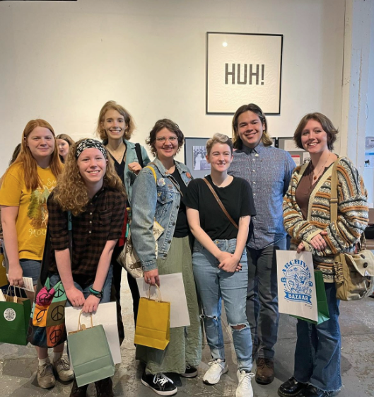 Trinity students attending the San Antonio Archives Bazaar. Chris Junginger is third from the right.