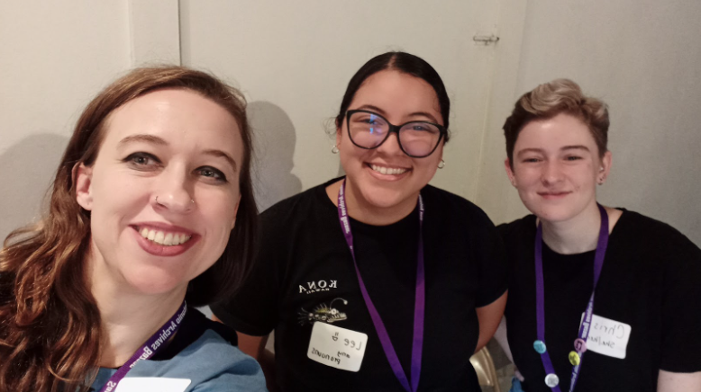 University Archivist Abra Schnur with students Lee Denney and Chris Junginger volunteering at the San Antonio Archives Bazaar.