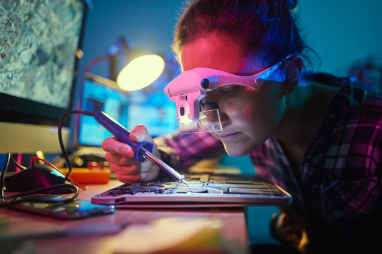 Engineer woman, motherboard and soldering iron for manufacturing, microchip and it development. Information technology, circuit board and electronics for programming, hardware and system with tools.